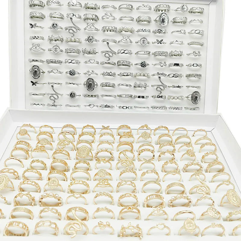 Lot de 30 bagues assorties, style perle, couleur argent, avec chaîne serpent et motif feuille ajourée.