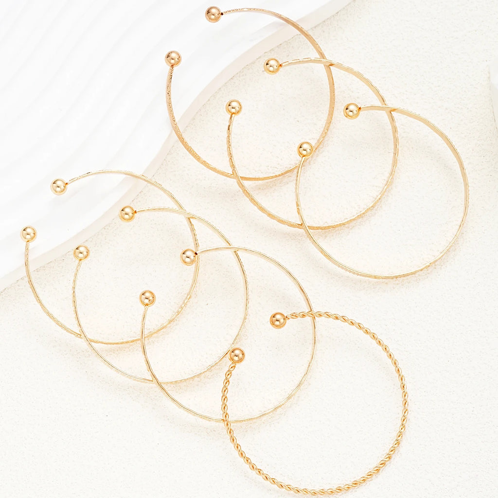 Ensemble de 7 bracelets punk dorés pour femmes, style streetwear gothique, imprimés cœurs, design en métal, jonc ouvert